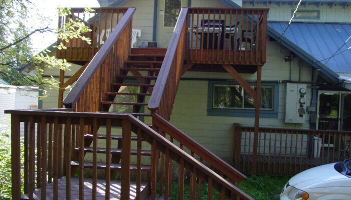 Wooden stairs leading to cozy house deck
