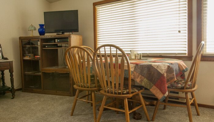 Cozy living room with dining table and TV cabinet