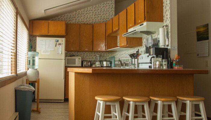 Cozy kitchen with wooden cabinets and breakfast bar